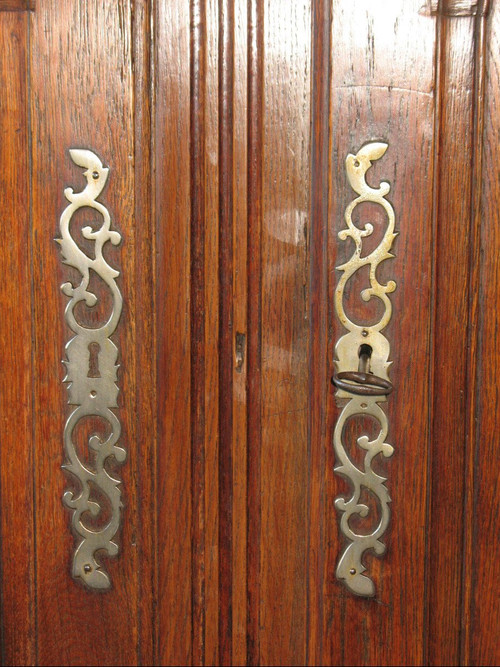 Low sideboard in molded and carved oak in the Louis XV style, 19th century