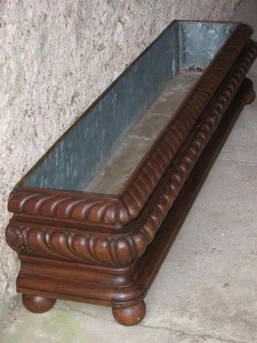 Large, long planter complete with zinc interior from the 19th century in the Louis XIII style