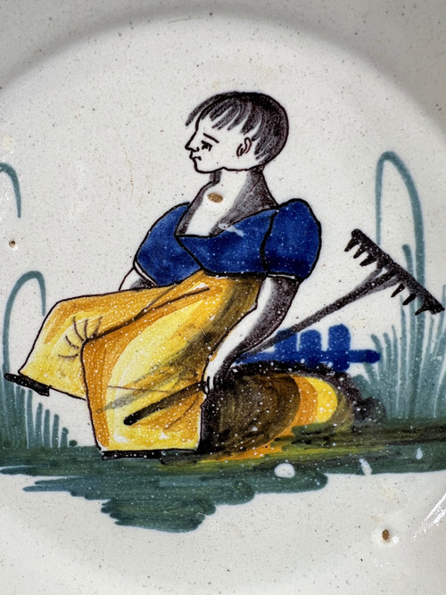 19th earthenware plate from Nevers Ancy le Franc decor profession woman with rake