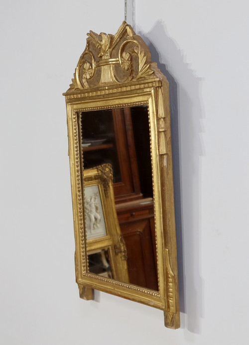 Miroir en bois doré, style louis XVI – Début XXe