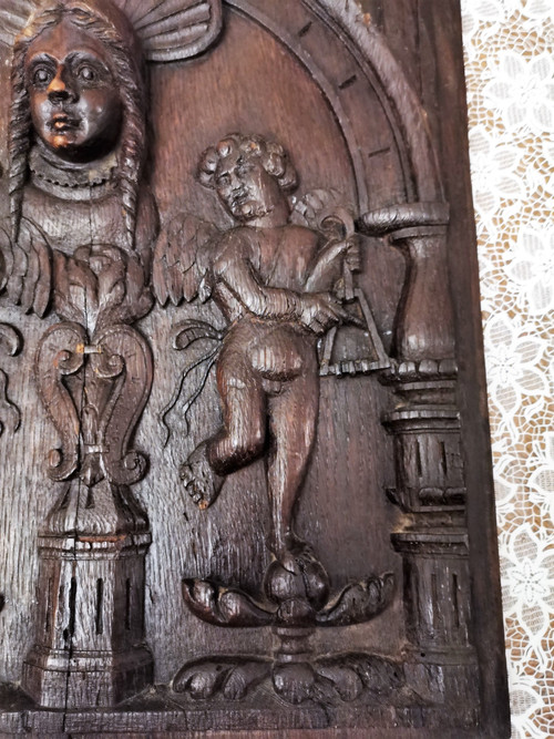 17th century oak panel carved with a Virgin between two Musician Angels, height 48 x width 41 cm