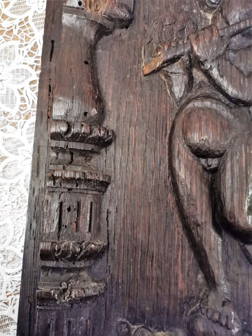 17th century oak panel carved with a Virgin between two Musician Angels, height 48 x width 41 cm