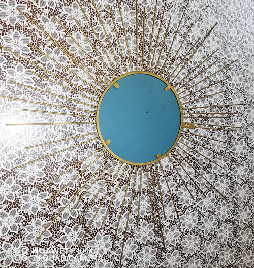 Old wall-mounted sun mirror in gilded brass in the spirit of (Chaty Vallauris)