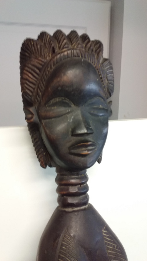 Wakémia ceremonial spoon decorated with a Liberian woman's head