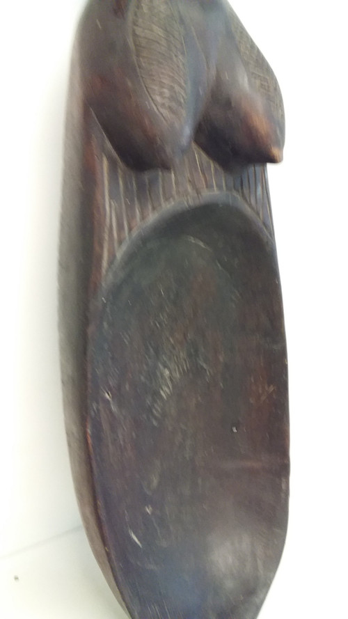 Wakémia ceremonial spoon decorated with a Liberian woman's head