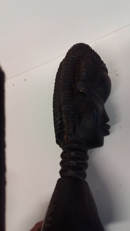 Wakémia ceremonial spoon decorated with a Liberian woman's head