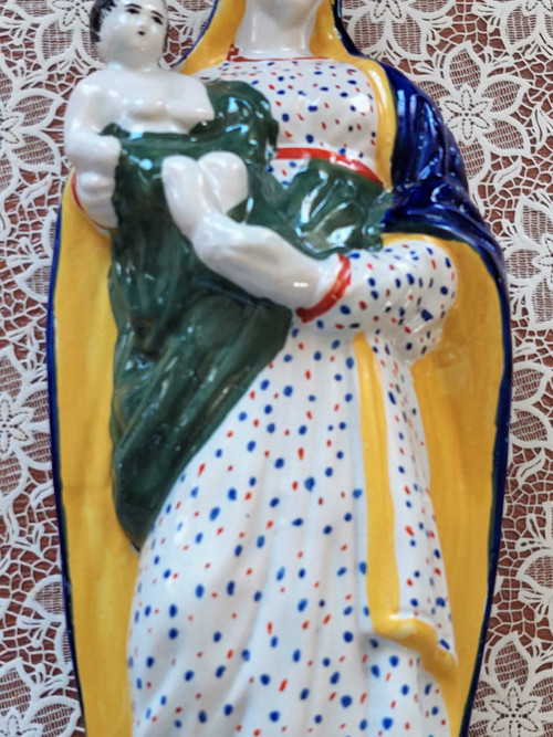 Statuette en faience de Quimper représentant la Vierge tenant l'Enfant Jésus fin XIXème siècle