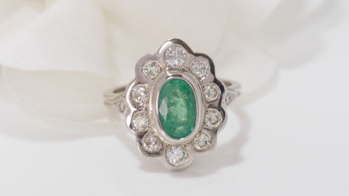 Entourage Ring In White Gold Emerald And Diamonds