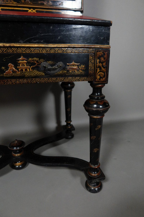 Black lacquer cabinet with floral design