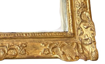 18th century Regence period carved and gilded wood mirror