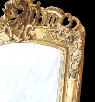 18th century Regence period carved and gilded wood mirror