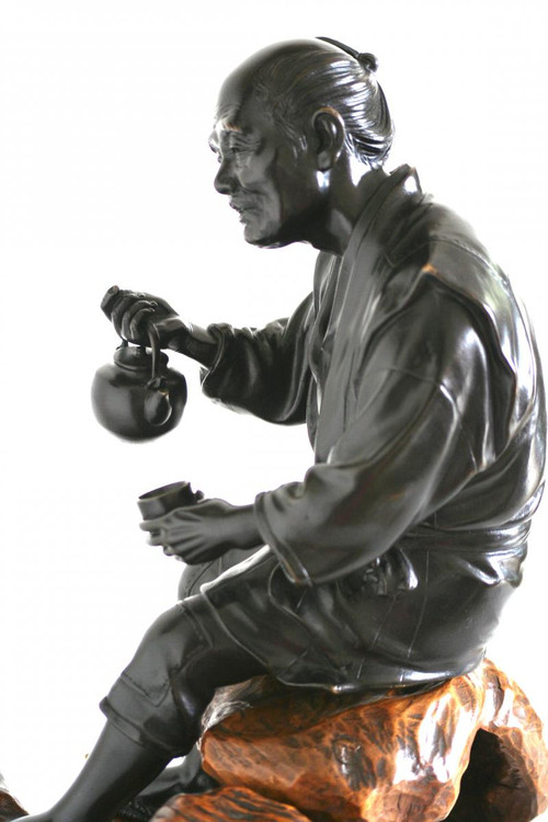 Bronze statue with black patina, Okimono - Japanese man, late Meiji period