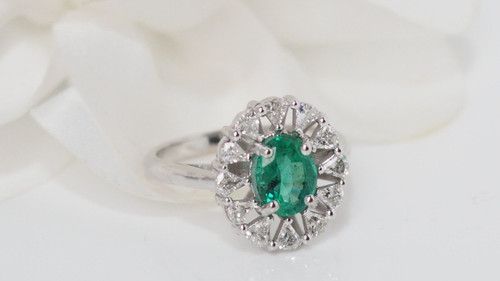 Entourage Ring In White Gold, Oval Emerald And Diamonds