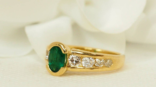 Ring In Yellow Gold, Oval Emerald And Diamonds