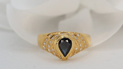 Yellow Gold Ring Set With A Pear Sapphire And Diamonds