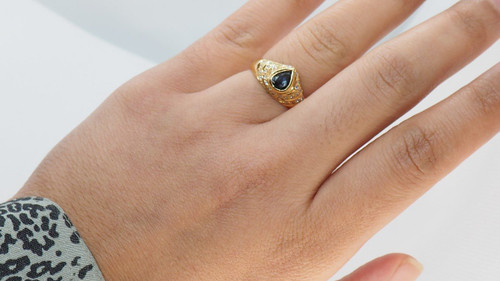 Yellow Gold Ring Set With A Pear Sapphire And Diamonds