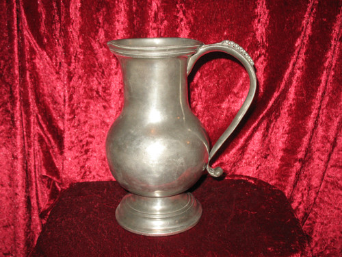 Pewter water jug in the shape of a caterpillar baluster early 18th century