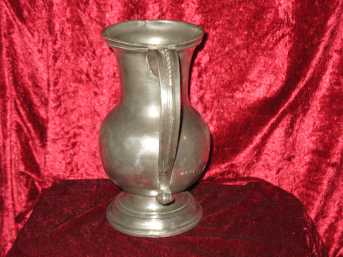 Pewter water jug in the shape of a caterpillar baluster early 18th century