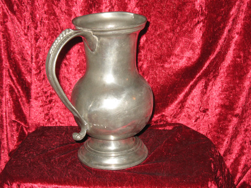 Pewter water jug in the shape of a caterpillar baluster early 18th century