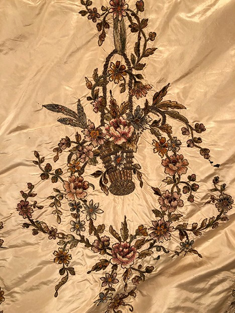 Bedspread converted into a silk portière with rich cannetille embroidery, 19th century