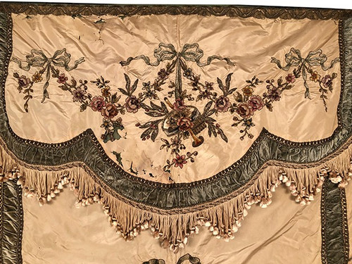 Bedspread converted into a silk portière with rich cannetille embroidery, 19th century