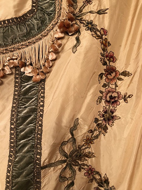 Bedspread converted into a silk portière with rich cannetille embroidery, 19th century