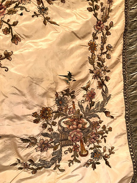 Bedspread converted into a silk portière with rich cannetille embroidery, 19th century