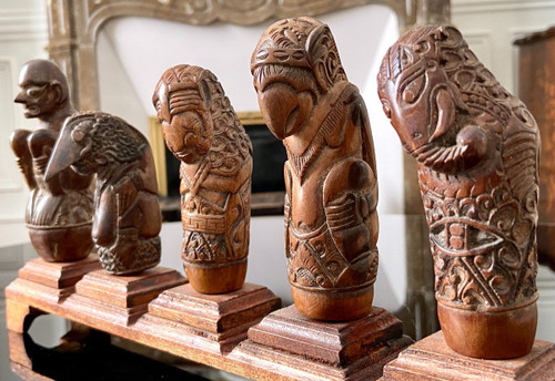 Indonesia, 19th Century, Five Carved Wood Kriss Handles with Anthropo-zoomorph decoration.