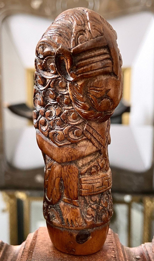 Indonesia, 19th Century, Five Carved Wood Kriss Handles with Anthropo-zoomorph decoration.