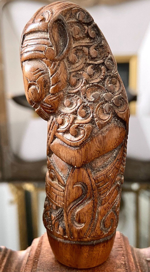 Indonesia, 19th Century, Five Carved Wood Kriss Handles with Anthropo-zoomorph decoration.