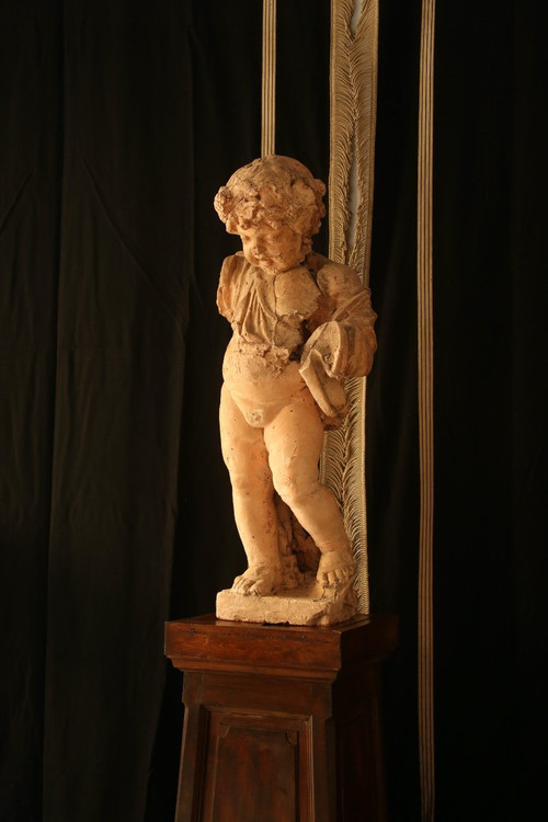 Scultura In Gesso Colorato Raffigurante Un Putto.