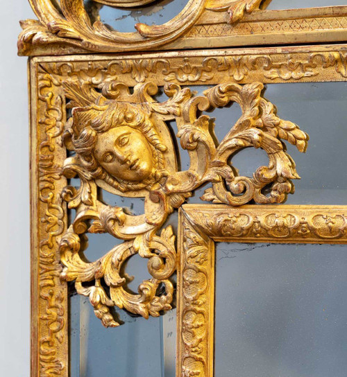 Large Louis XIV period gilded wood mirror with glazing beads