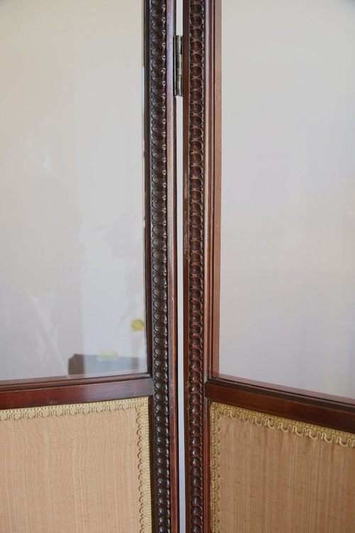 Louis XVI-style carved and stained mahogany beech screen.