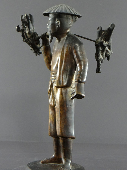 Vietnam, Early 20th Century, Bronze Statuette Peasant Carrying Fagots.