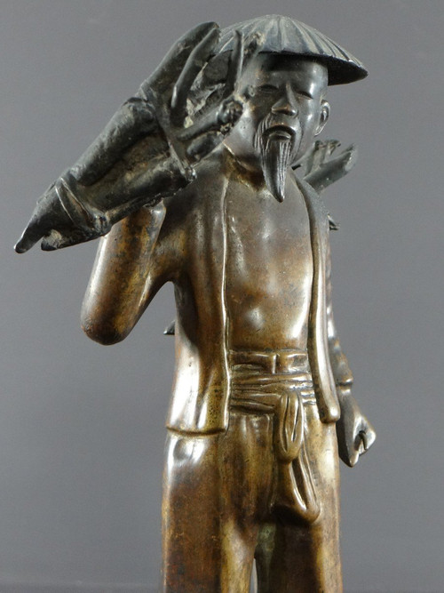 Vietnam, Early 20th Century, Bronze Statuette Peasant Carrying Fagots.