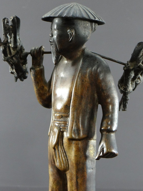 Vietnam, Early 20th Century, Bronze Statuette Peasant Carrying Fagots.