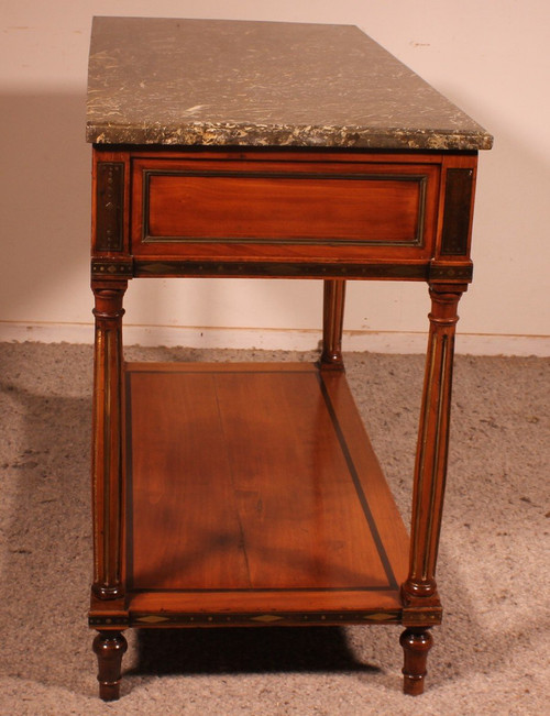 Louis XVI console in cherry wood, 18th century, stamped L.M. Pluvinet