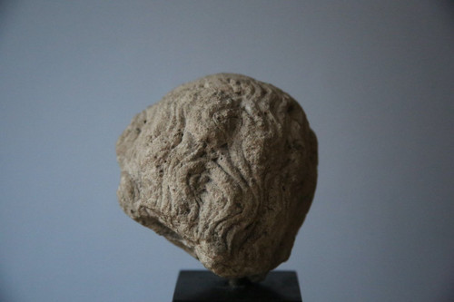 Carved stone head, 15th century.