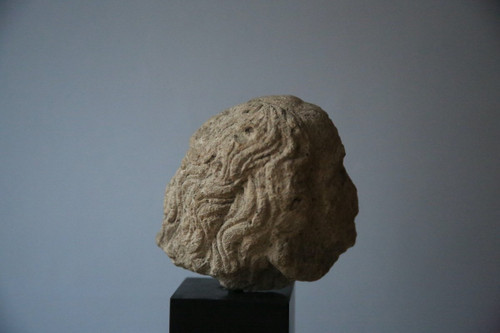 Carved stone head, 15th century.