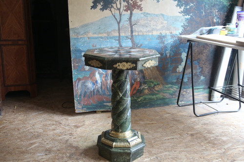 Empire-style pedestal table in green marble and marble marquetry