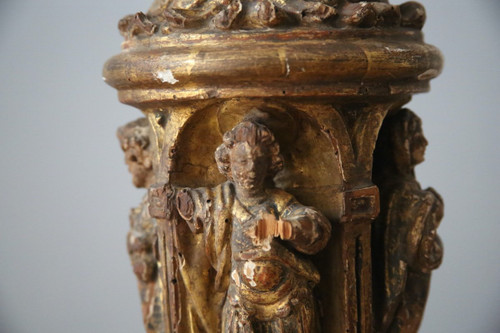 Carved, gilded and painted wood candleholder, Spanish work, 17th century