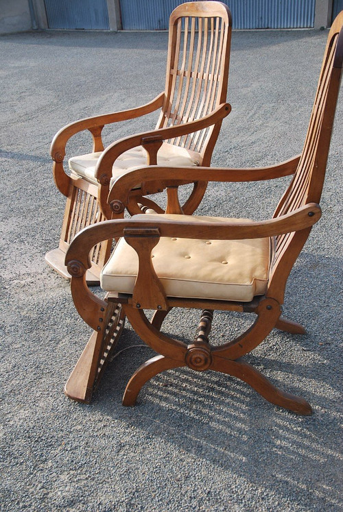 Pair Of Large Walnut Rocking Armchairs