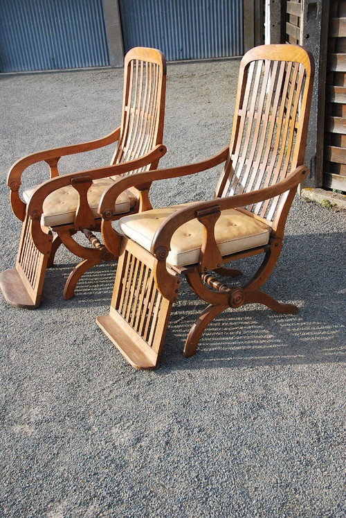 Pair Of Large Walnut Rocking Armchairs