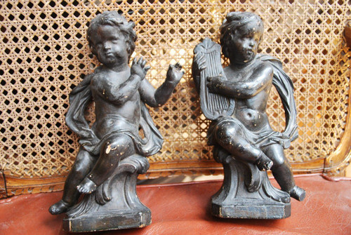 Coppia di putti musicanti in legno del XVIII secolo