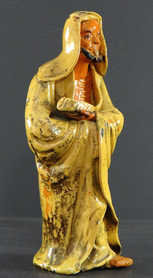 China, Early 20th Century, Glazed Earthenware Arhat Statue.