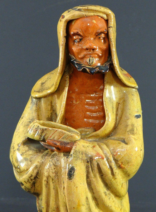 China, Early 20th Century, Glazed Earthenware Arhat Statue.