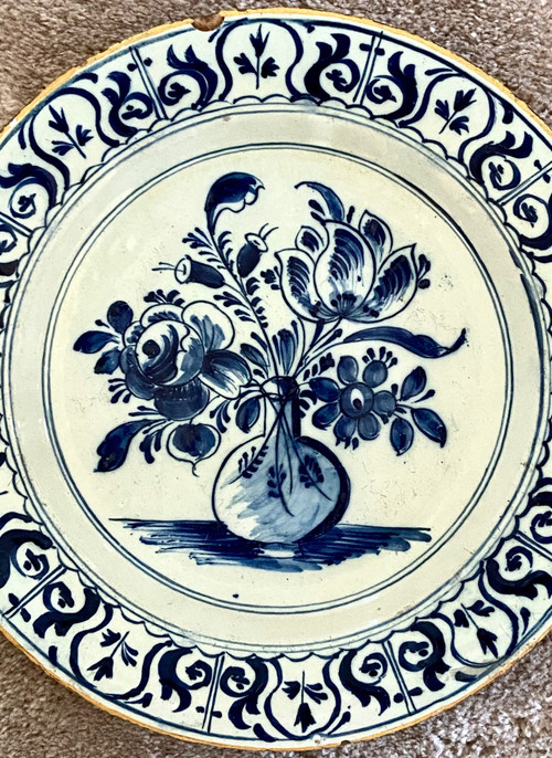 Delft, 18th Century, Earthenware Dish Decorated With Flowered Bottle Vase.