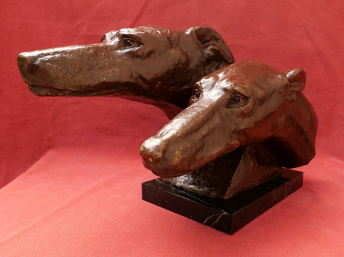 M. BERTIN, Two greyhound heads