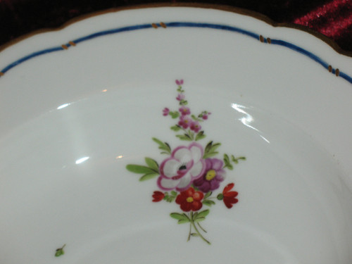 Locré porcelain plate with floral decoration, 18th century