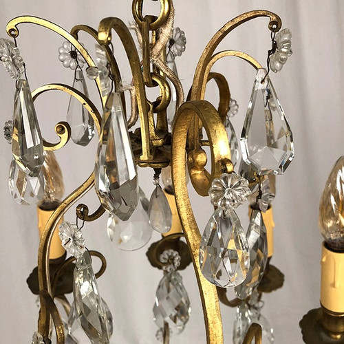 Cage chandelier in gilded brass and glass pendants